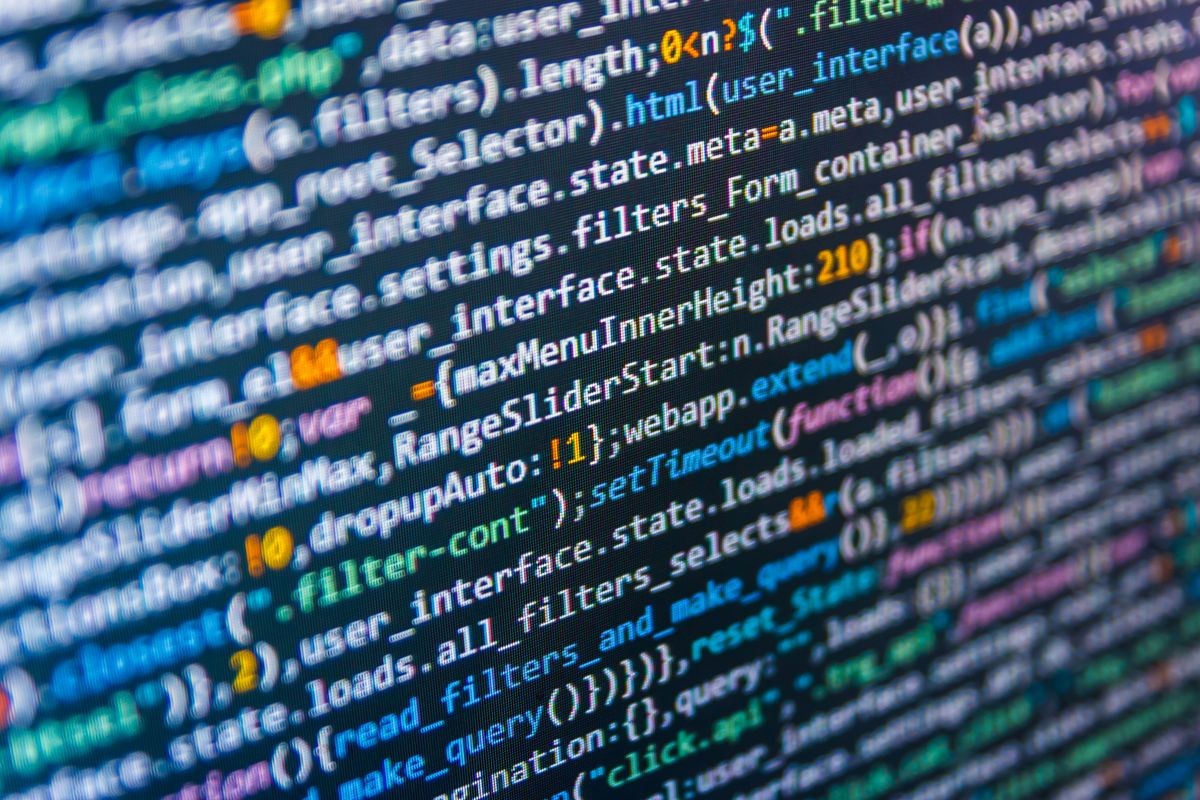 PHP and coding technologies. JS, Closeup cooperating in web specialist apps. Programmer coding preview. Web working on computer. Screen at workplace of modern programmer on networking background. PHP and coding technologies. JS, Closeup cooperating in web specialist apps. Programmer coding preview. Web working on computer. Screen at workplace of modern programmer on networking background.